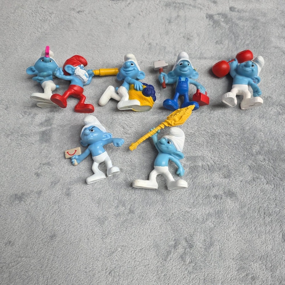 LOT OF 7 VINTAGE THE SMURFS COLECTIBLE FIGURINES FROM MCDONALDS